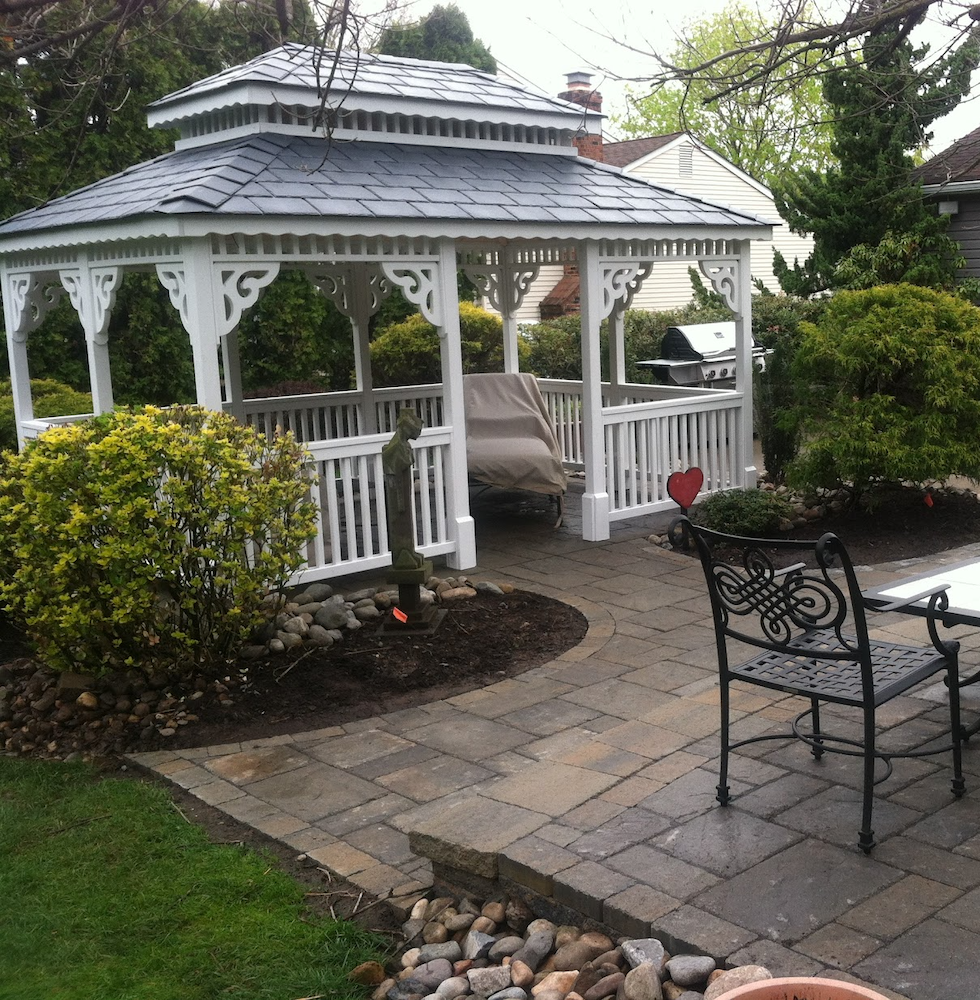 Gazebo beside a patio and landscaping