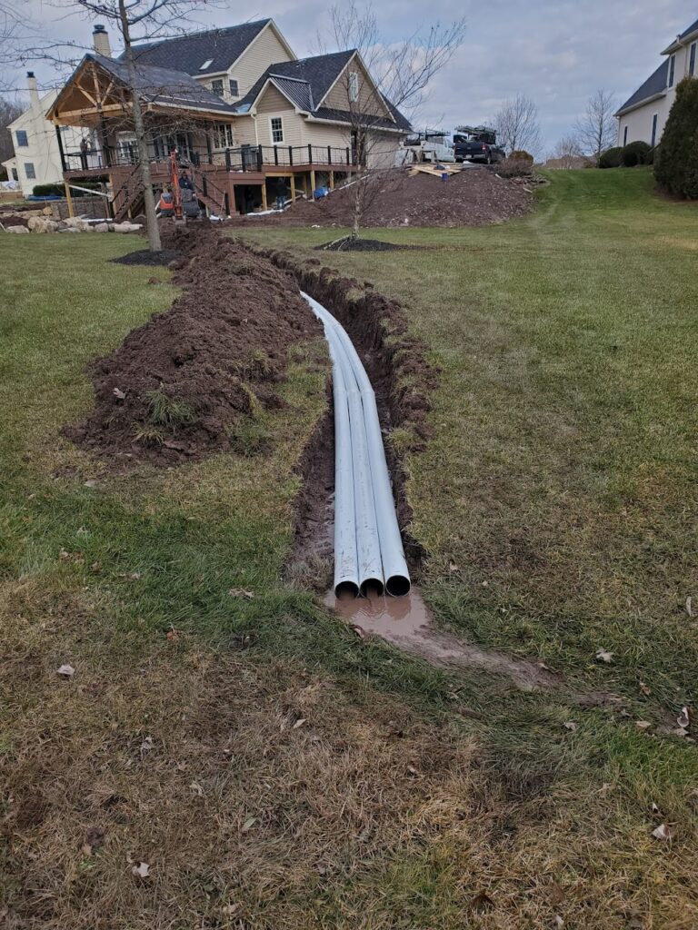 Excavation for pipes leading away from a house