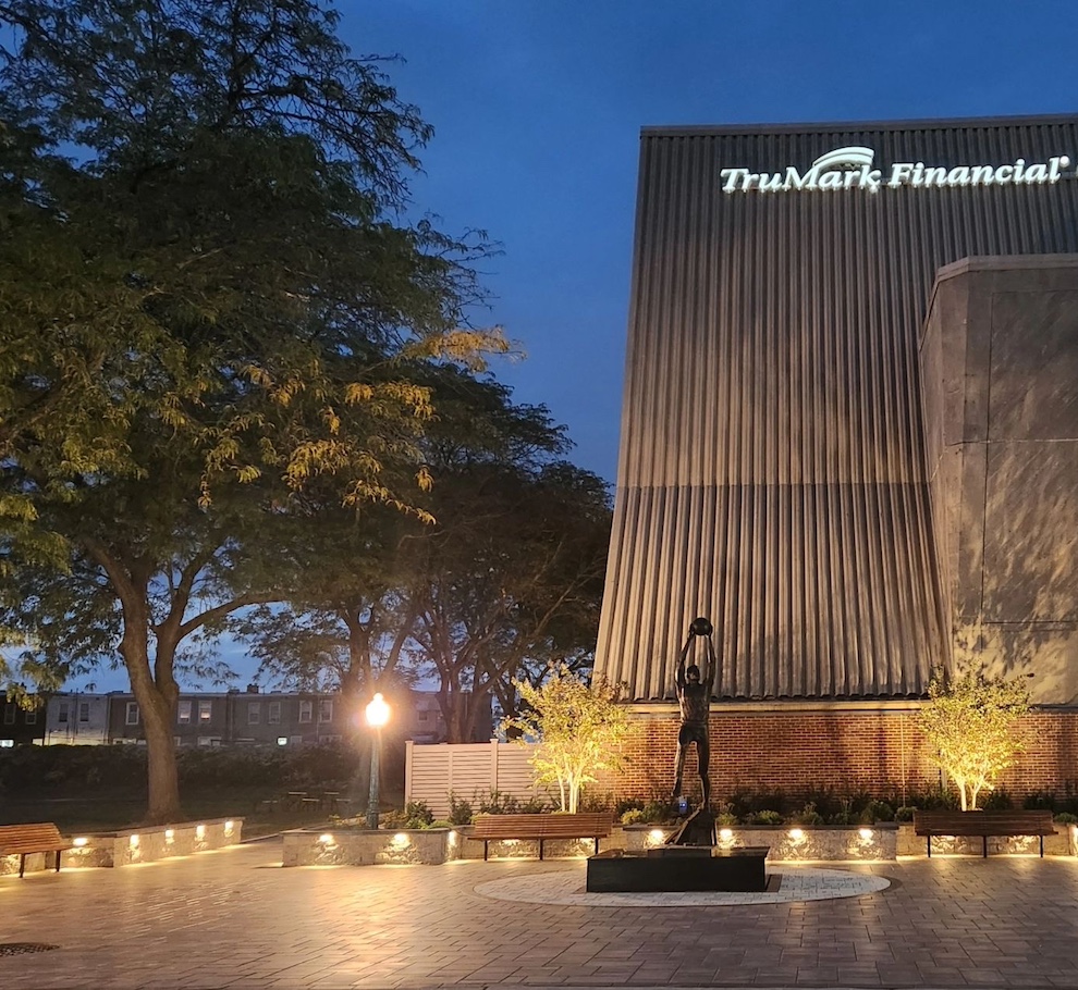 Memorial statue with custom paver design and lighting