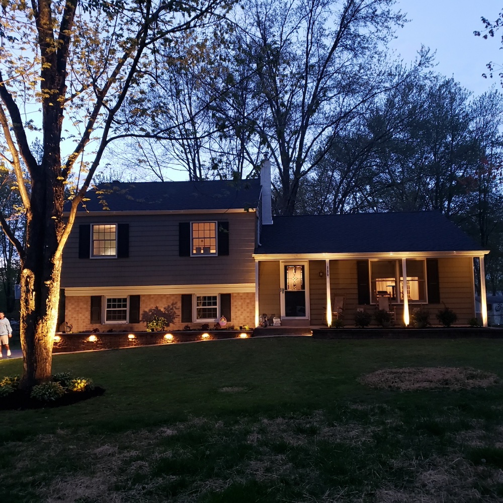 Custom lighting added to walkway and porch